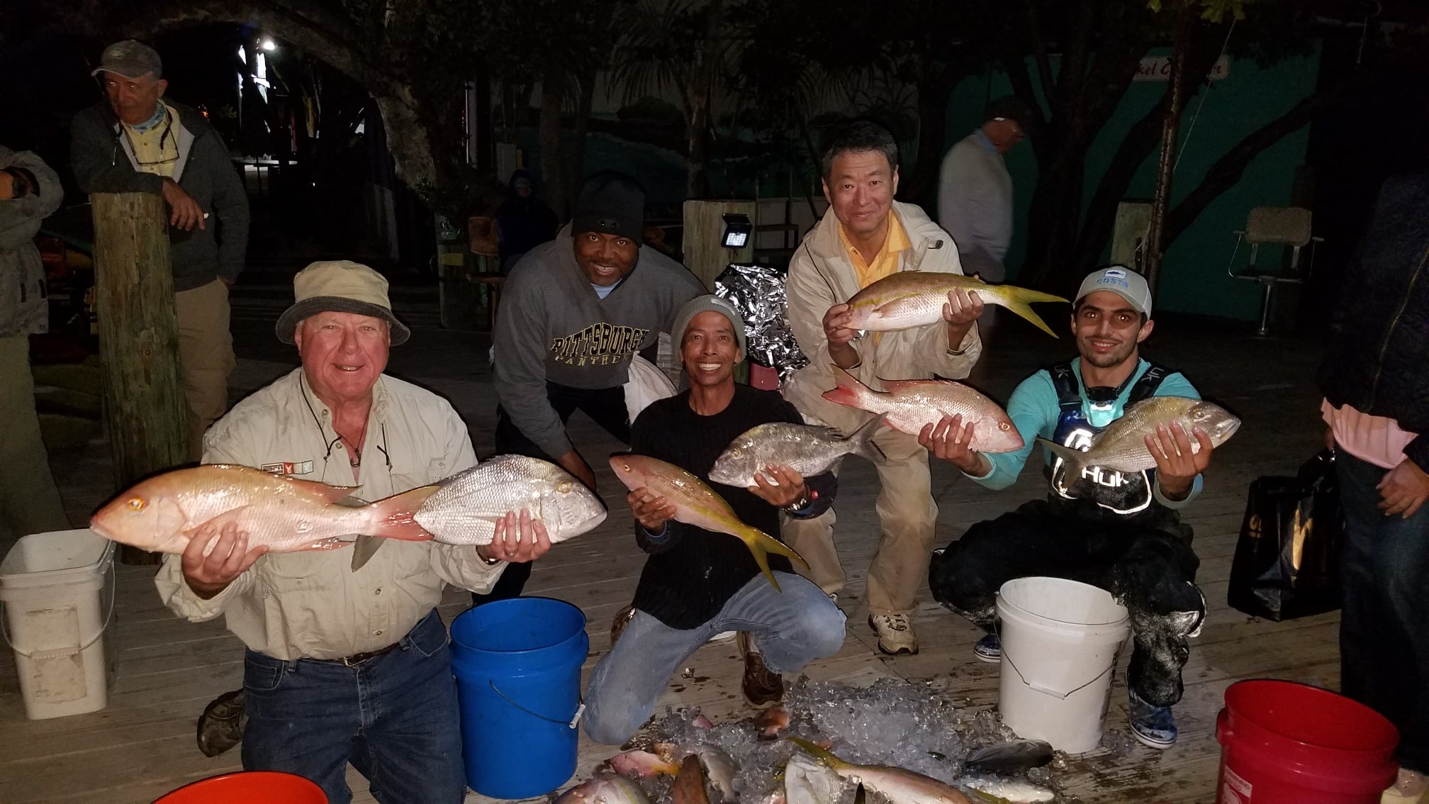 Happy group of people fishing