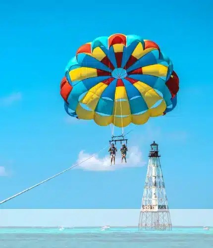 Two people parasailing