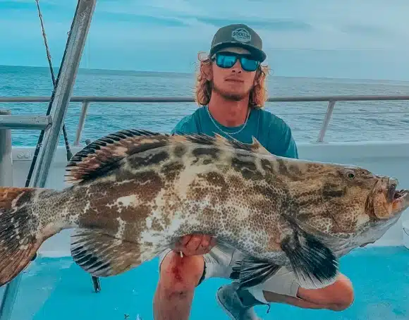 man with her catch